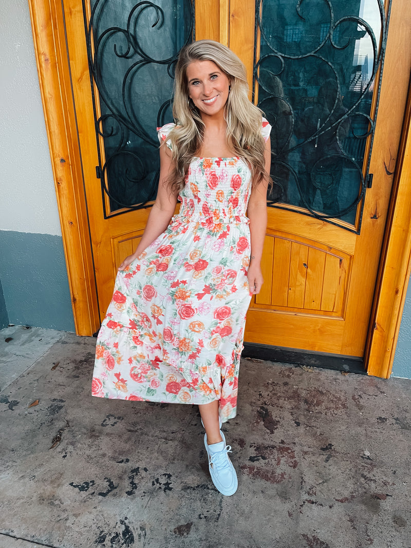 This Piece of Heaven Midi Dress is a stunning example of an everyday wardrobe must-have. Featuring a stunning floral print, midi length, ruffled hem and fully lined design, it has all the features needed for a timeless, chic look. With its square neckline, this dress will have you looking and feeling like you stepped out straight from the runway.