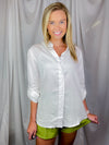 Top features a solid base color, long sleeves, button down fit, thing material and runs true to size! 
