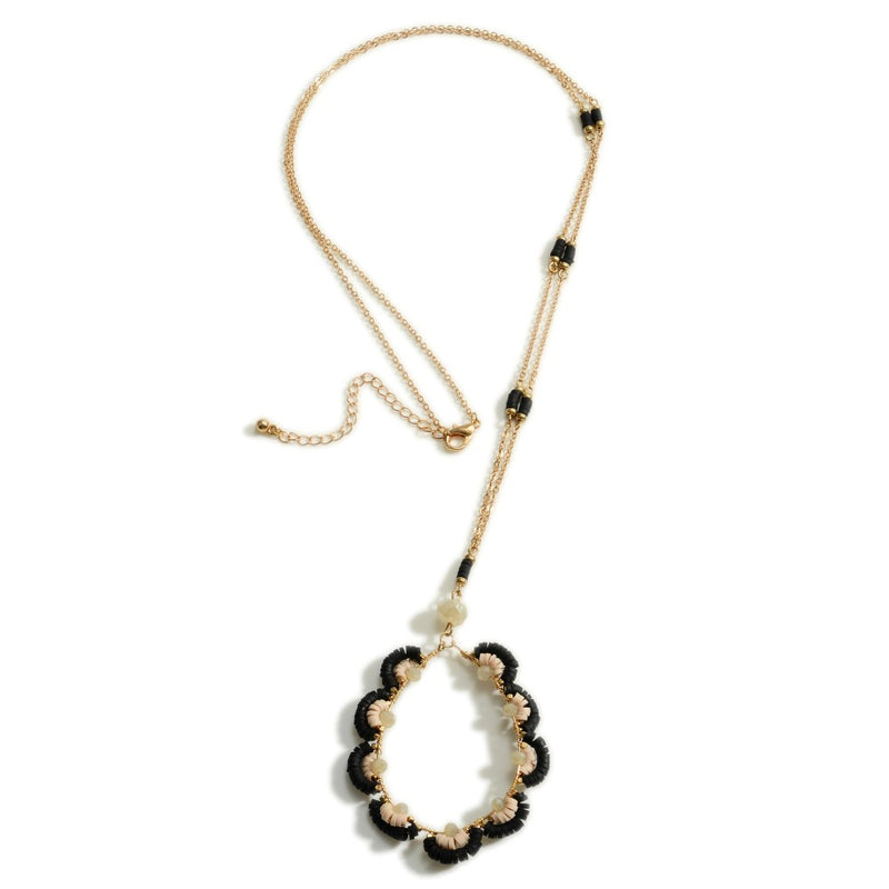 DESCRIPTION: Long Gold Tone Heishi Bead Pendant Necklace  - Approximately 36