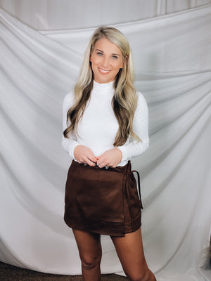 Skort features a solid base color, suede material, side tie and runs true to size!-BROWN