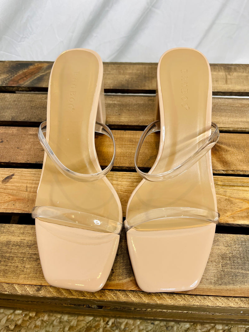 Heels features a nude bottom, padded base, double clear straps, and runs true to size! 