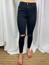Jeans feature a jet black color, front distressing, skinny leg fit, high waist line and runs true to size! 