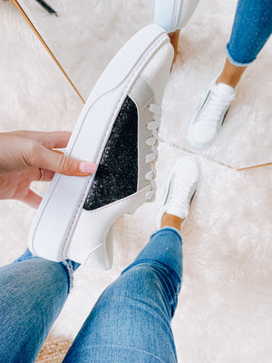 Sneakers feature a lace up detail, padded insole, white bottom, glitter siding, and runs true to size!   *HALF SIZES- have been sizing down*-black