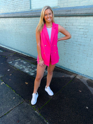 Blazer features a jaw dropping hot pink color, sleeveless detail, open front detail, front pockets, functional buttons and runs true to size!   Matching shorts feature a zip up closure, upper thigh length, belt detail, functional pockets and runs true to size! 