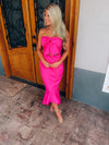 Dress features a solid base color, strapless detail, high-low hem line, front tie bow, mermaid fit and runs true to size! -hot pink