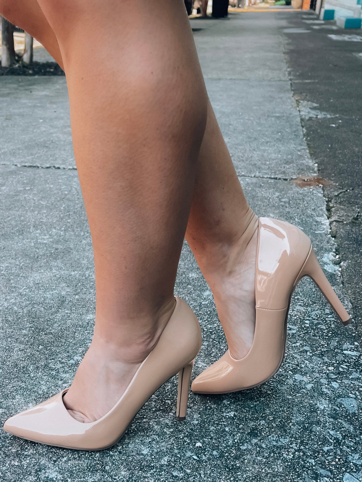 Heels feature a simple nude color, point toe detail, pump heel and runs true to size! 