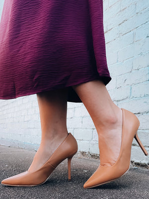 Heels features a patten nude color, pointy toe, stiletto heel, padded base, and runs true to size