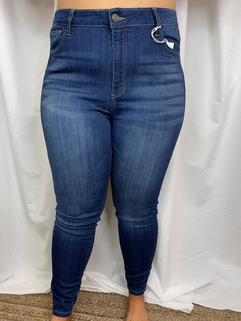 Bottoms feature a dark denim wash, high waist line, skinny leg fit and runs true to size! 