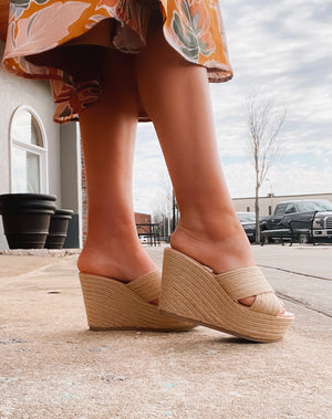 These Cutest Quality Wedges represent the pinnacle of footwear. Crafted from wheat-colored raffia material and featuring a stylish wedge heel, these shoes are perfect for both weekend getaways and special occasions. Their versatile design ensures you'll be able to rock them for any and all occasions.