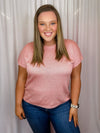Top features a solid base color, knitted material, crew neck line, short sleeves, and runs true to size! -pink