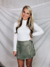 Skort features a solid base color, suede material, side tie and runs true to size!-SAGE