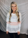Sweater features an ivory base, thin multi colored stripes, round neck line, long sleeves, soft material and runs true to size!-CORAL