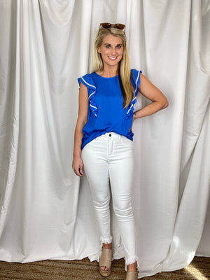 Bottoms feature a true white color, skinny fit, frayed hem, functional pockets, skinny leg fit and runs true to size! 