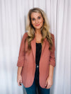 Blazer features a solid base color, 3/4 sleeves, open front, shawl collar detail and runs true to size!-mauve