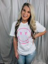 Graphic tee features a solid base colored tee, grey leopard print happy face with pink detailing, short sleeves, unisex fit, round neck line, legging length approval and runs true to size! 