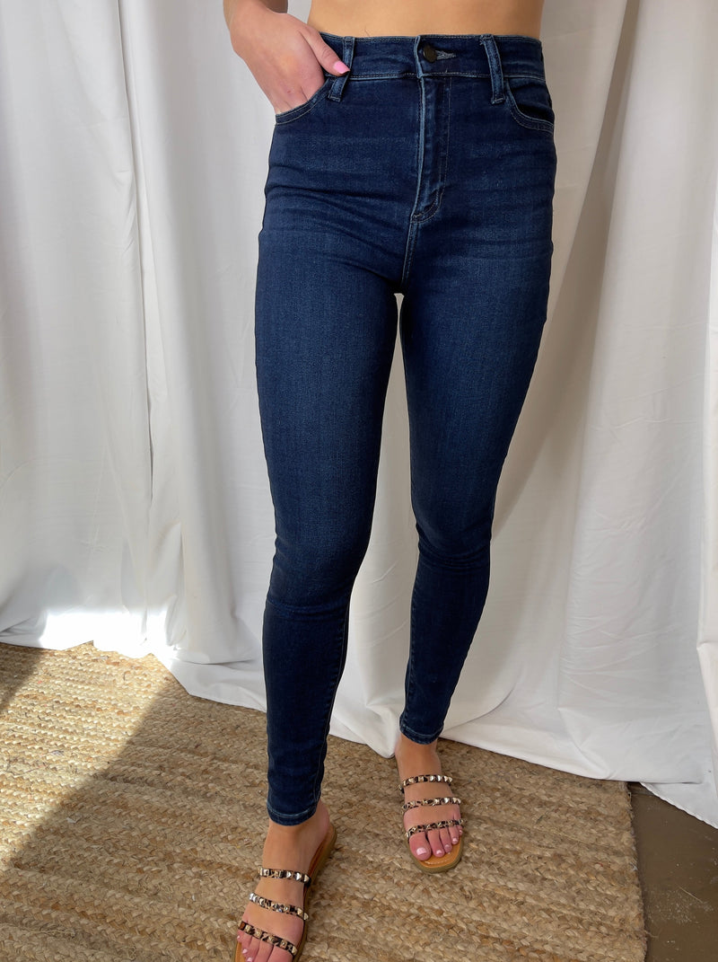 Our signature skinny jeans reengineered for those with an hourglass shape. The result? A narrower waist with a contoured band, a longer rise ( for a rounder booty), and a little extra room at the hips and thighs. Additionally equipped with five pockets, belt loops and a zip fly closure.      Import  Inseam: 28” Rise: 11”  Fabric Content: 57.1% Cotton 35.4% Modal 6.4% Polyester 1.1% Lycra