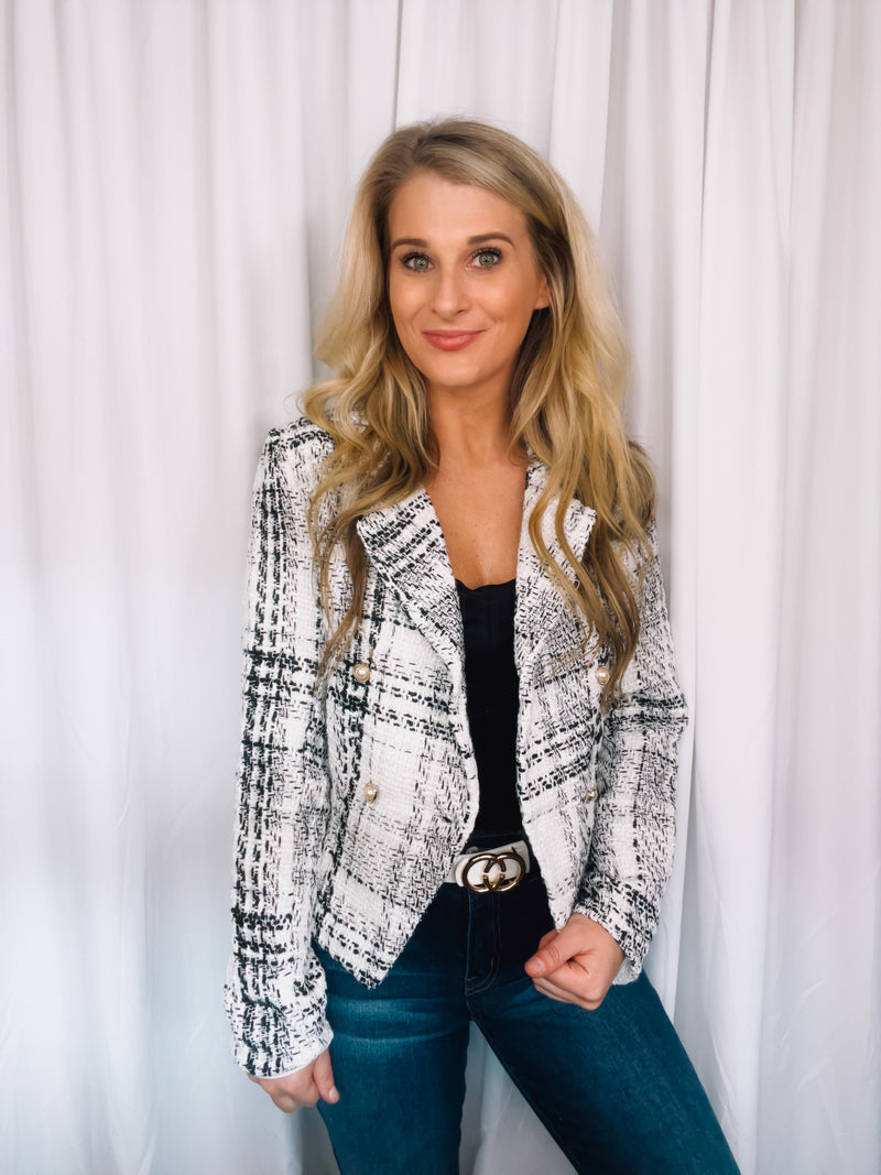 Blazer features a tweed material, long sleeves, underlining detail, V-neck line, front button closure and runs true to size! 