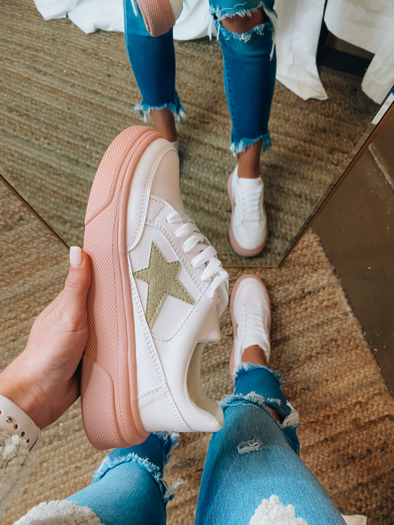 Sneakers feature a padded insole, gold star, lace up detail, blush bottom accent and runs true to size!   *HALF SIZES- have been sizing down*