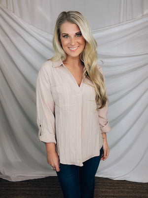 This top features a khaki base color, tiny gold glitter stripes, 3/4 sleeves. light weight material and runs true to size! 