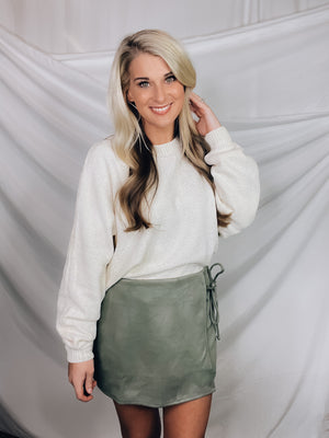 Skort features a solid base color, suede material, side tie and runs true to size!-SAGE