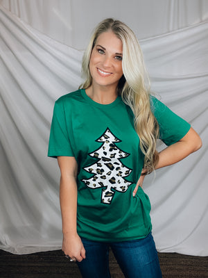 Graphic tee features a solid base color, unisex fit, short sleeves, leopard Christmas tee design, legging length approval and runs true to size! 