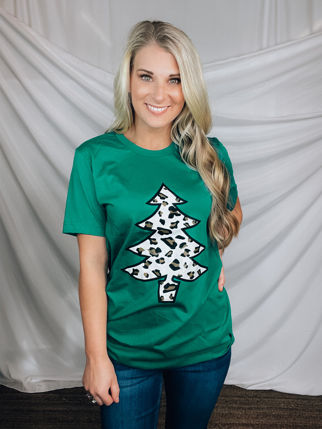 Graphic tee features a solid base color, unisex fit, short sleeves, leopard Christmas tee design, legging length approval and runs true to size! 