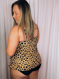 Be the wild one in our daring From The Wild One Piece Swimsuit. Featuring an eye-catching leopard print, layered skirt detail, adjustable straps, and full coverage, this playful swimsuit is as flattering as it is fierce and sure to turn heads! So don't be shy, rock it and roar! 