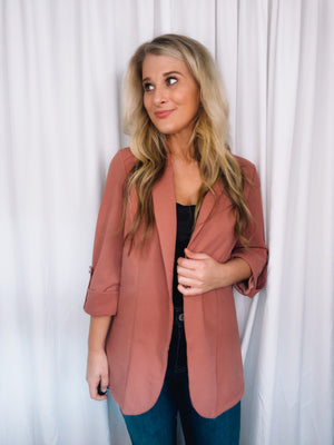 Blazer features a solid base color, 3/4 sleeves, open front, shawl collar detail and runs true to size!-mauve