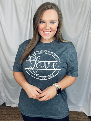 Graphic tee features a unisex fit, heathered solid base colored tee, white ink, short sleeves, legging length approval and runs true to size! -GREY