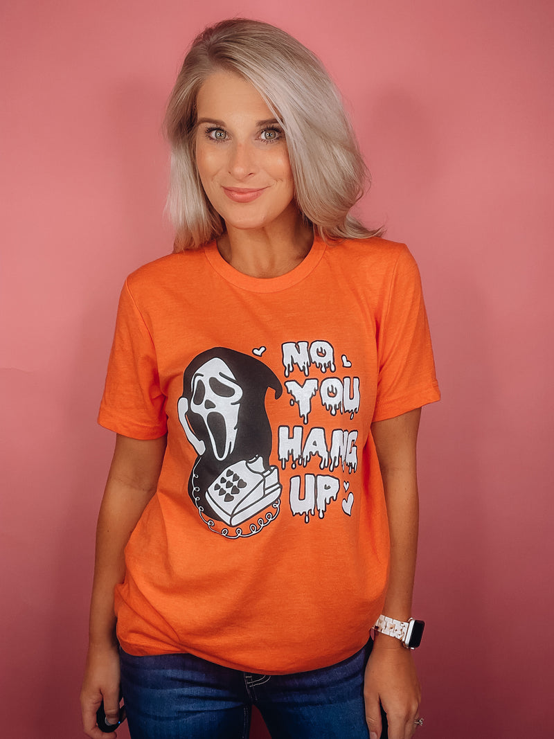 Graphic features a solid base color, black & white scream design, short sleeves, unisex fit and runs true to size! -orange