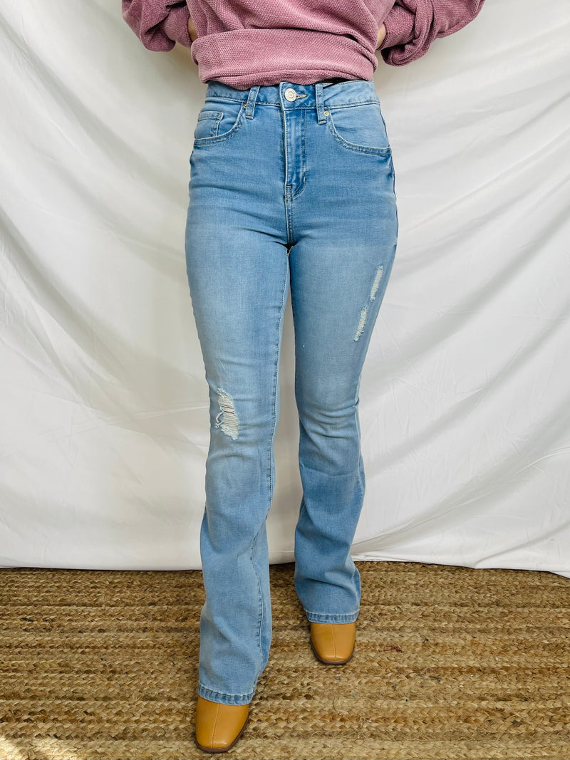 Jeans feature a light wash, 32