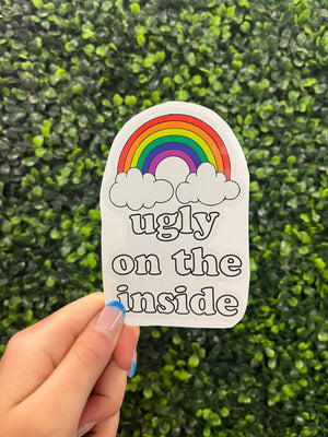 Express your true self with this "Ugly On The Inside" sticker decal. Show your friends you're not afraid to be a little quirky and show your weird side! Add some humor to your car, laptop, or any other smooth surface and let everyone know you're not as perfect as you seem. Ugly's never been so beautiful!