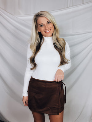 Skort features a solid base color, suede material, side tie and runs true to size!-BROWN