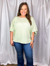 This top features a solid base color, kimono sleeves, knit top, crew neck and runs true to size! Not see through- model has on a nude bra and it was perfect.  *Our photography lights make it seem more sheer than it is-mint