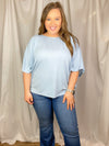 This top features a solid base color, kimono sleeves, knit top, crew neck and runs true to size! Not see through- model has on a nude bra and it was perfect.  *Our photography lights make it seem more sheer than it is-sky