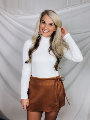 Skort features a solid base color, suede material, side tie and runs true to size!-CAMEL
