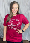 Graphic tee features a unisex fit, heathered solid base colored tee, white ink, short sleeves, legging length approval and runs true to size!-RED