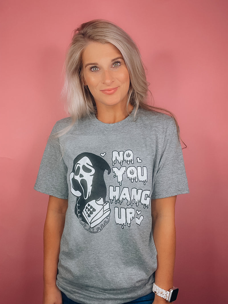 Graphic features a solid base color, black & white scream design, short sleeves, unisex fit and runs true to size! -grey