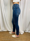 Jeans feature a dark denim, mid rise waist, functional pockets, skinny leg fit, and runs true to size! 