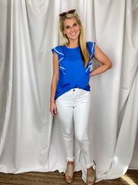 Bottoms feature a true white color, skinny fit, frayed hem, functional pockets, skinny leg fit and runs true to size! 