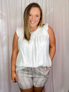 Bottoms feature a light weight material, elastic drawstring, side pockets, patterned design and runs true to size!-taupe