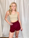 Sports Bra features a double lined feature, and does not include padding. Runs true to size!-taupe