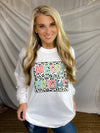 Graphic tee features a white base, long sleeves, unisex fit, round neck line, leopard box and neon and pastel colored lettering, and runs true to size! 