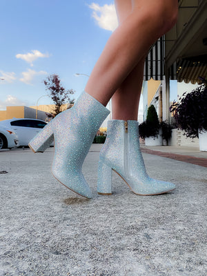 Booties feature a show stopping appearance, block heel, full sequin/rhinestone detailing, side zip-up closure and runs true to size! -silver