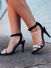 Shoes feature a black base, pearl toe strap detailing, ankle strap fasten, 4" heel and runs true to size! 