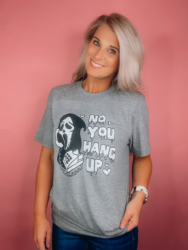 Graphic features a solid base color, black & white scream design, short sleeves, unisex fit and runs true to size! -grey