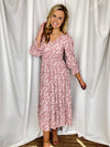 Dress features a dusty rose base, white floral print, midi length, 3/4 sleeves, elastic waist and wrist, knee length underlining, V-neck line and runs true to size! 